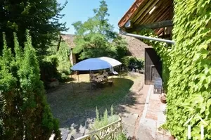 garden with sitting area, plenty of shadow and sun areas.