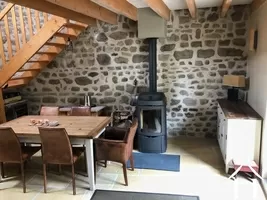 dining room with JOTUL wood burner