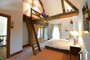 Bedroom on first floor with mezzanine sleeping area in tower