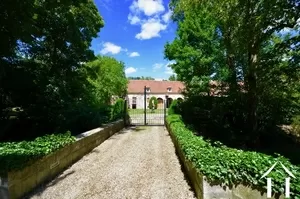 road over bridge over moat, and gate towards the annex