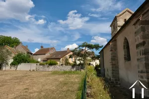 La maison vue de derrière l"église