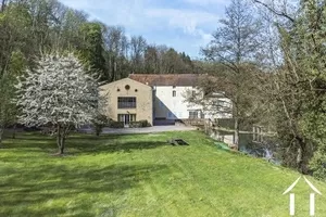 Looking from the meadow to the apartment and complex