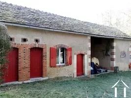 Outbuilding on the side of property