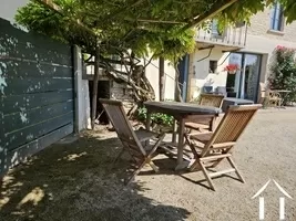  Courtyard seating area in front of facade