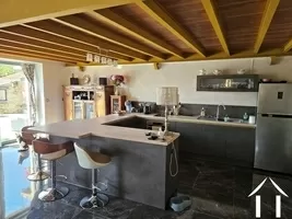 This spacious kitchen is perfect for cooking and entertaining guests.