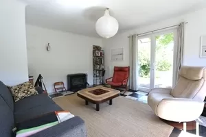 Living room opening onto a private garden