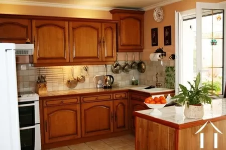 The kitchen is fitted with modern country-style units. The main entrance to the house is via the conservatory into the kitchen. 