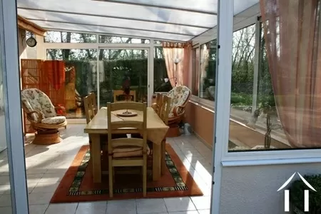 The veranda/conservatory provides a valuable extension to the property; it also encases (to one end of the property) the external staircase (no longer external!) that gives access to the two upstairs bedrooms and bathroom. 