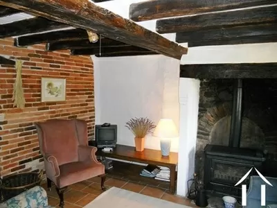 The lounge area of the gîte (with wood burning stove included). 
