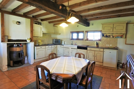 Fitted kitchen with dining area