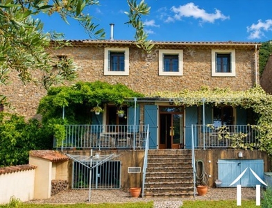 In Roquebrun, a beautifully renovated former wine cellar with pool and views, close to the restaurants and the river beach. Ref # EG09-6990 