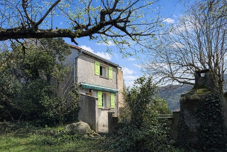 In a picturesque hamlet between Lamalou-les-Bains, Colombières-sur-Orb and Mons, at the foot of the majestic Caroux Mountain, this characterful hamlet house enjoys a quiet, elevated position. Ref # EG11-2542 