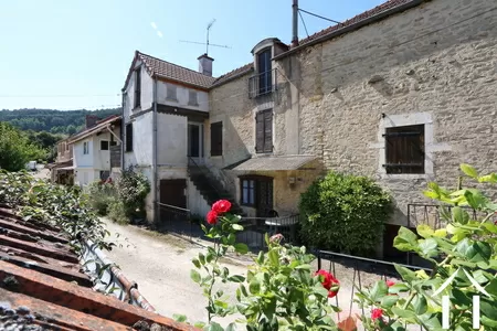 Maison dans cour commune