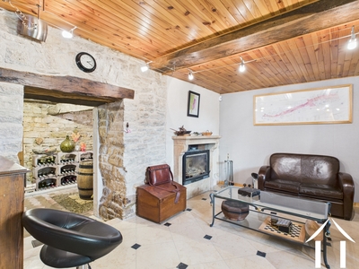Basement lounge with view on the wine cellar