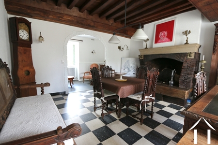 House 1: Living room with reading room in the back