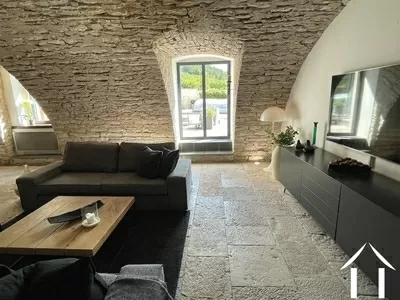 Living room with glass doors to the courtyard