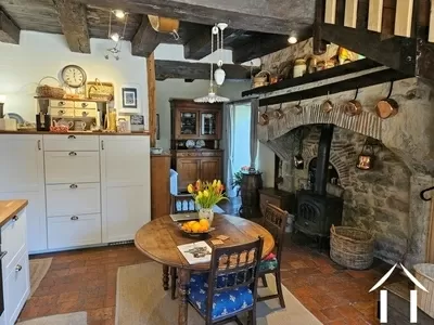 Kitchen with stone fireplace