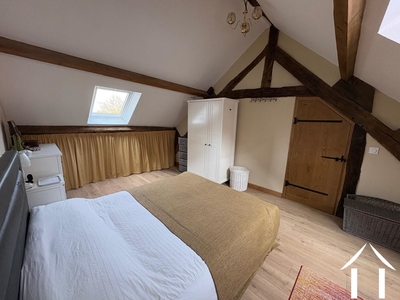 Master bedroom with exposed beams
