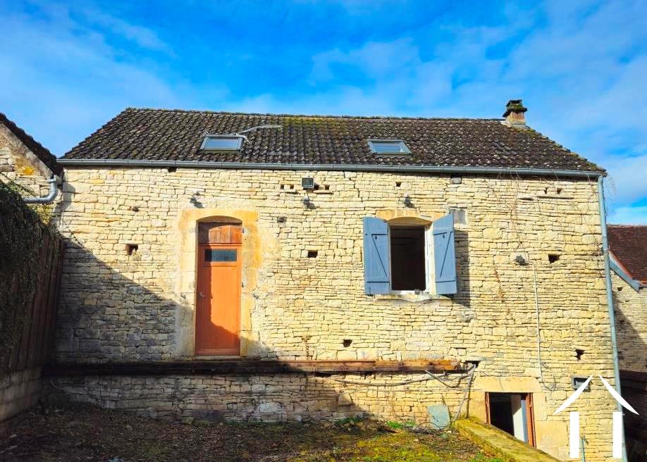 Two Houses in Village Setting.